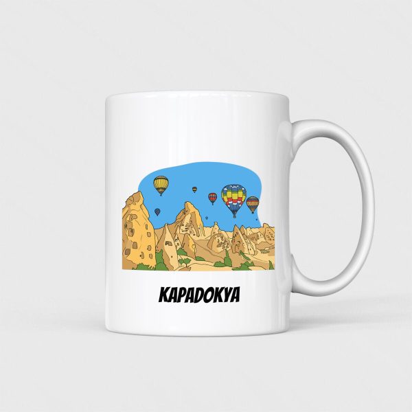 Kapadokya manzaralı ve sıcak hava balonlu beyaz seramik kupa bardak tasarımı.